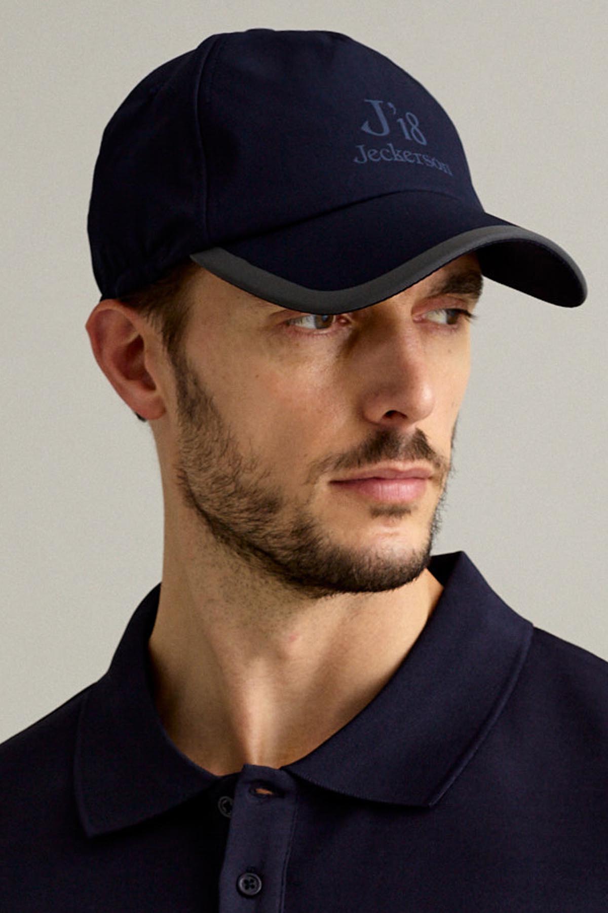 CAPPELLINO BLU SCURO SPORTIVO DA GOLF CON VISIERA - J18